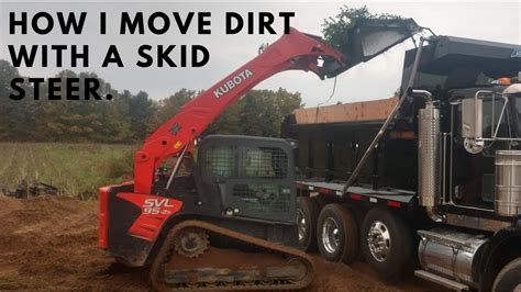 how to move dirt with skid steer